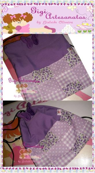 Linda mochilinha com aplique de borboleta e detalhes em patc